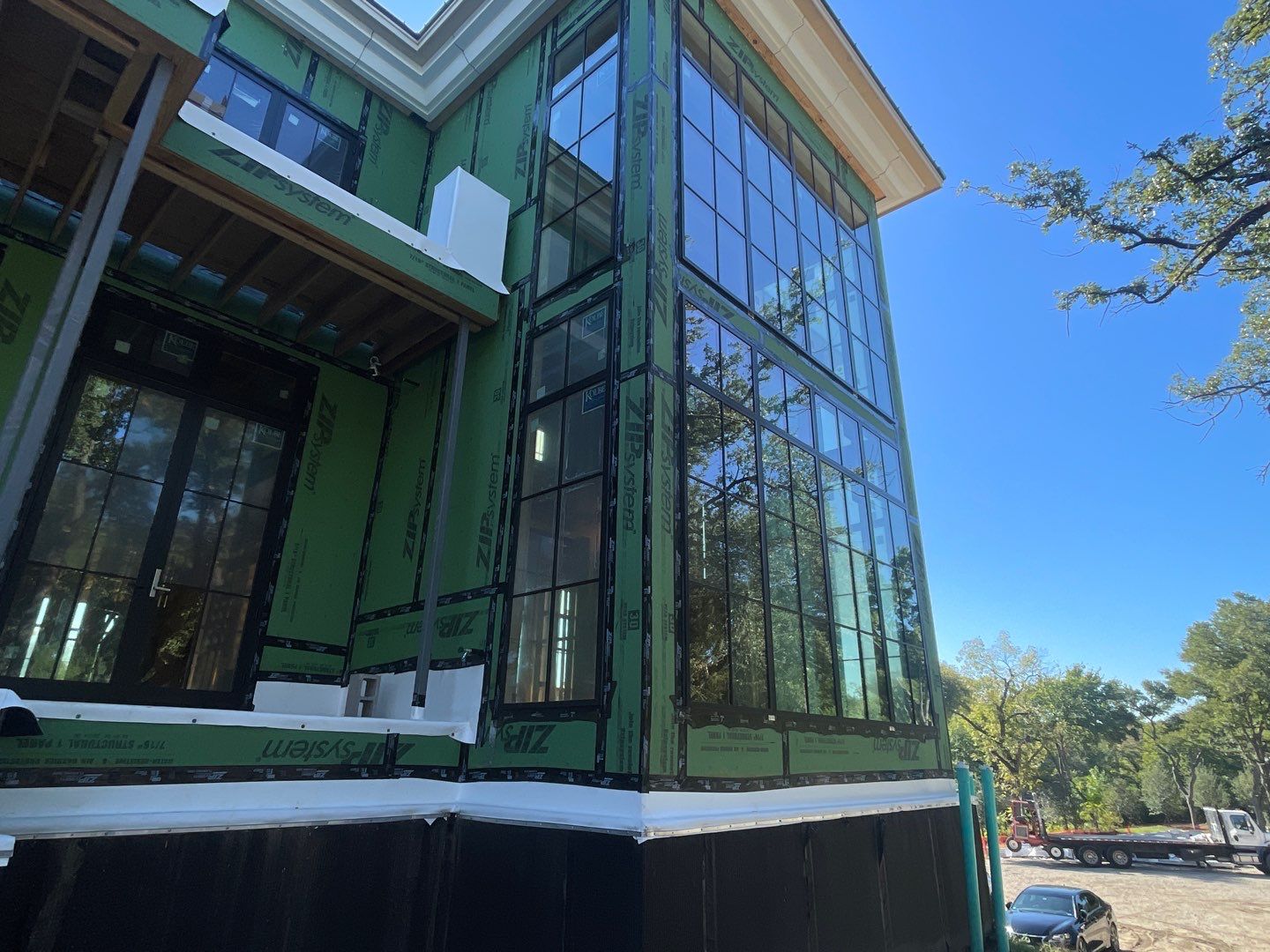 Metal panel trim at the building base